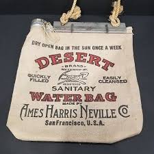 Vintage desert water bag with printed text, used for hydration in dry conditions, displayed as part of Hawthorne Historical Society's June 2023 newsletter.