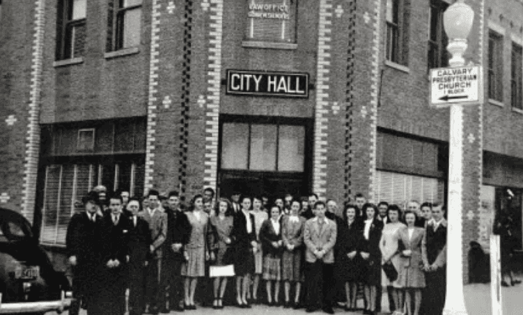 Historic group photo outside Hawthorne City Hall building.